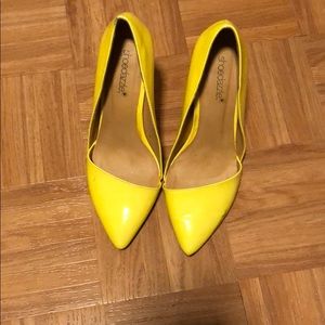 Neon yellow pumps